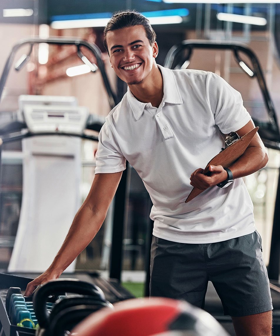 portrait-of-personal-trainer-at-the-gym